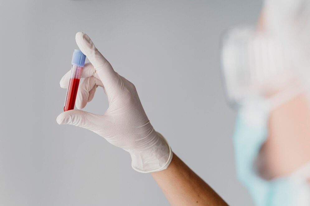 back-view-doctor-holding-blood-sample